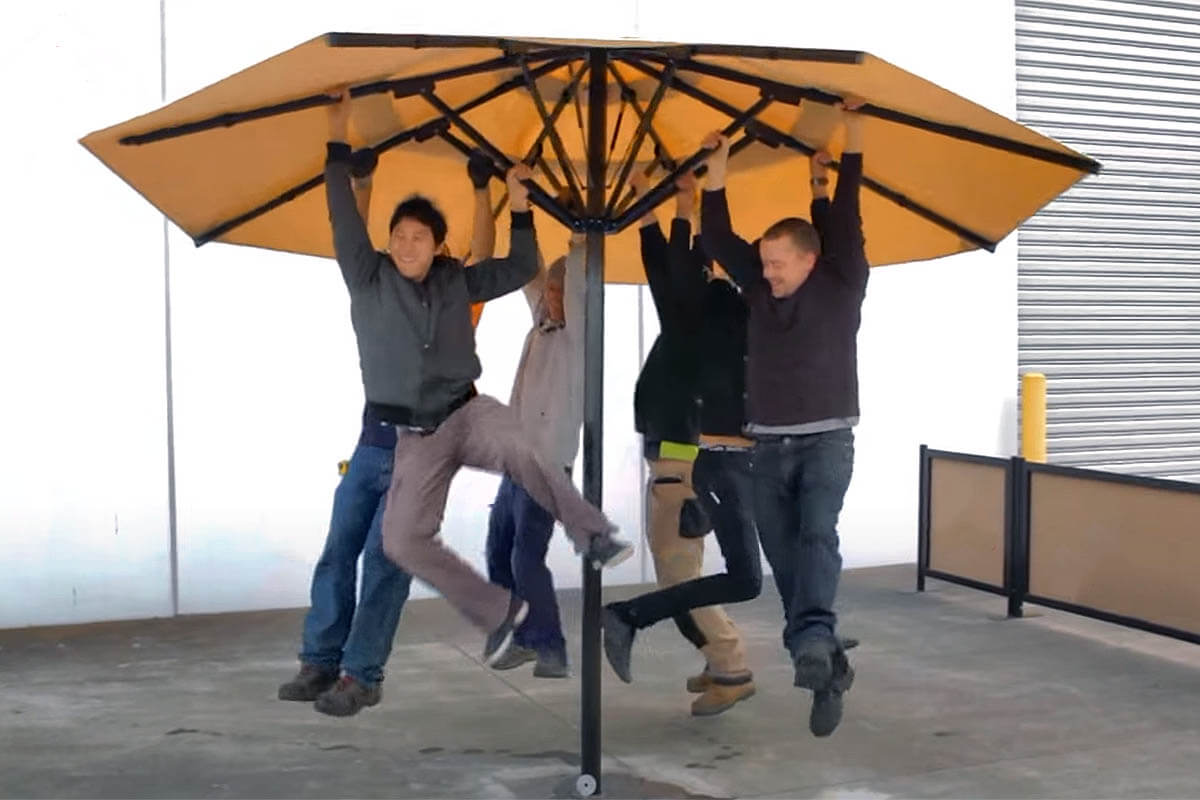 People Hanging From Umbrella